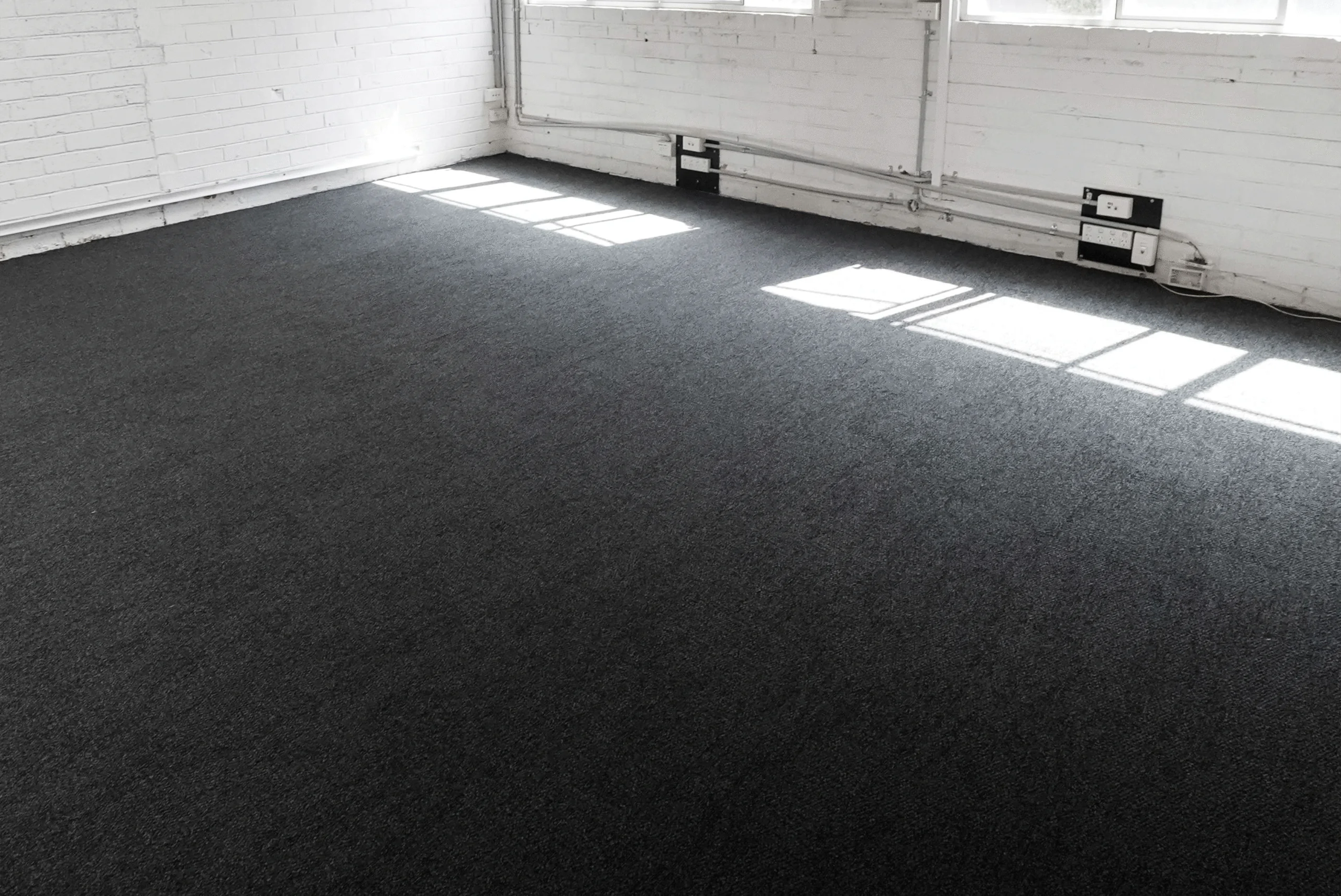 A home in Australia, after the carpets being installed in their living room.