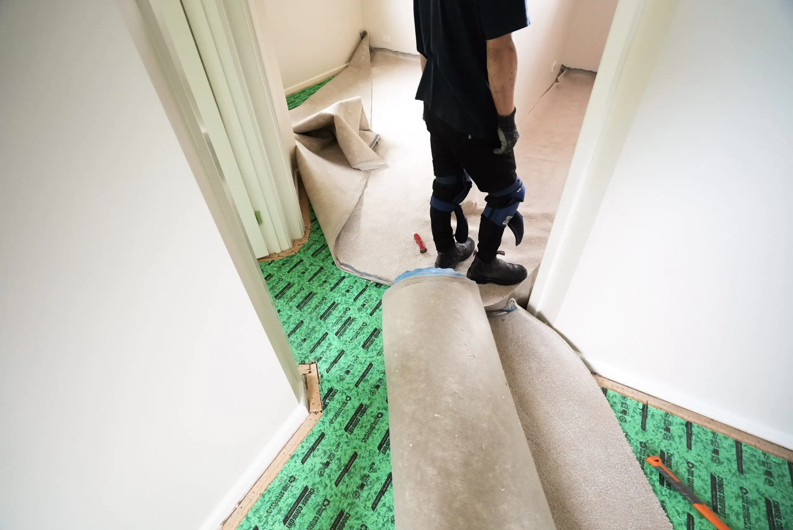 An Australian home hallway image just before the flooring installation by Jim's Flooring.