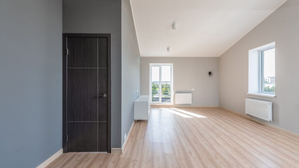 Flooring installation in Melbourne with freshly installed timber-look flooring- expert carpet, vinyl, hybrid, and laminate installation