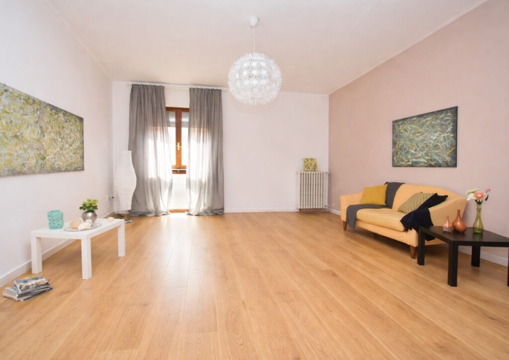 Bright living space featuring timber flooring installed in Geelong, highlighting clean finishes, natural light, and a modern open layout.